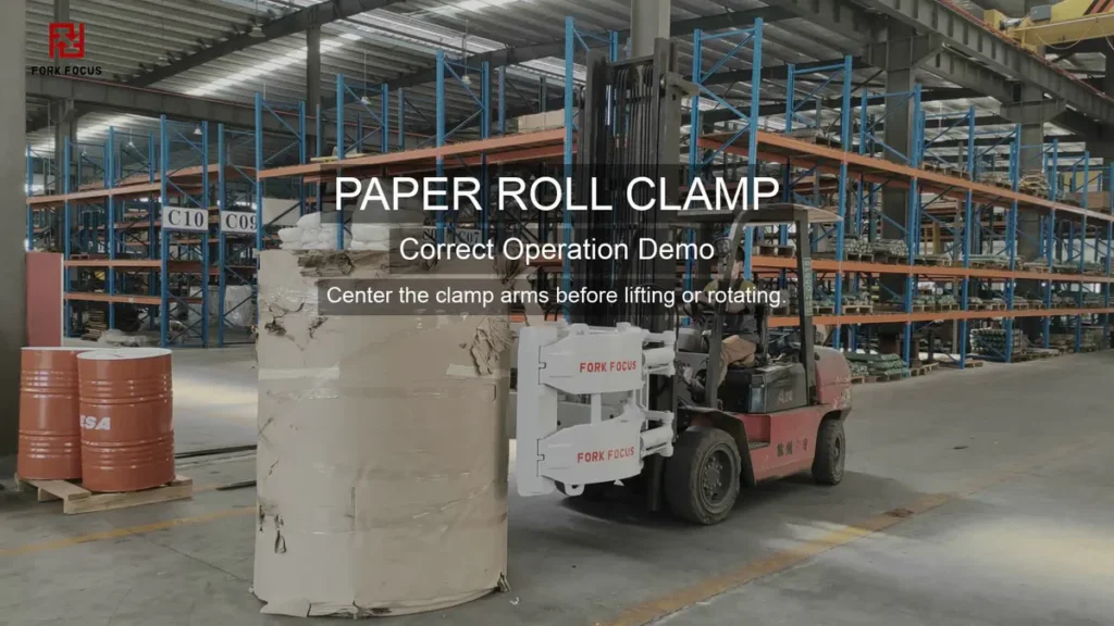 Paper roll clamp arms centered on the roll before lifting or rotating