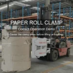 Paper roll clamp arms centered on the roll before lifting or rotating