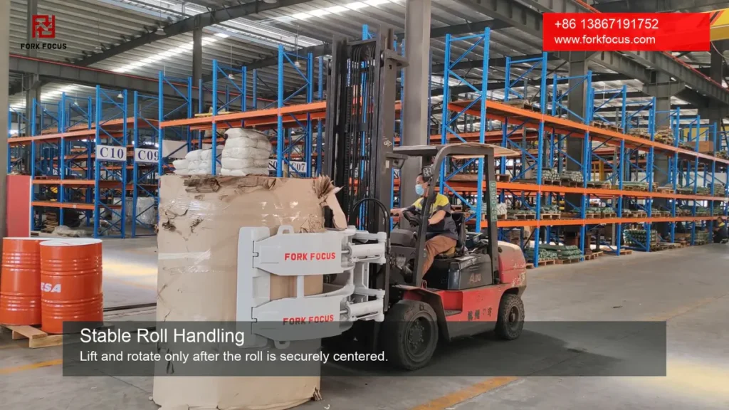 ForkFocus paper roll clamp securely centered for stable roll handling