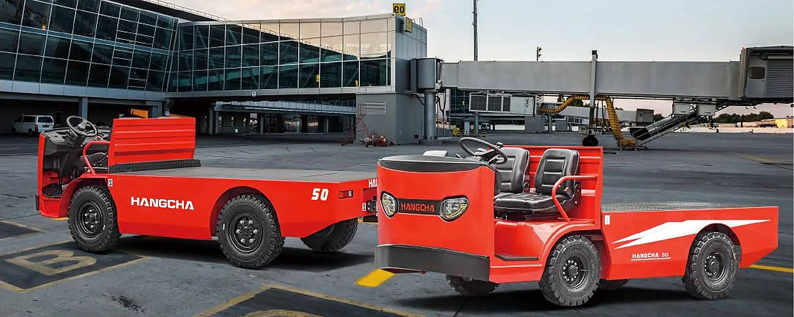 Hangcha electric platform trucks and personnel carrier at an airport