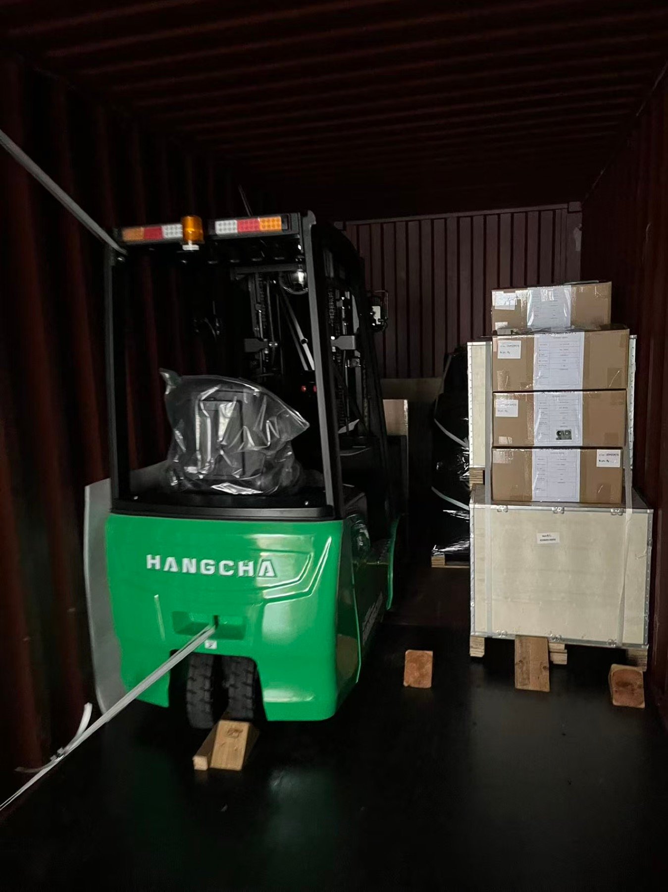 Forklift attachments prepared for container shipment