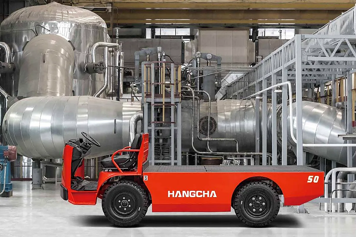 X Series electric platform truck moving materials in a factory