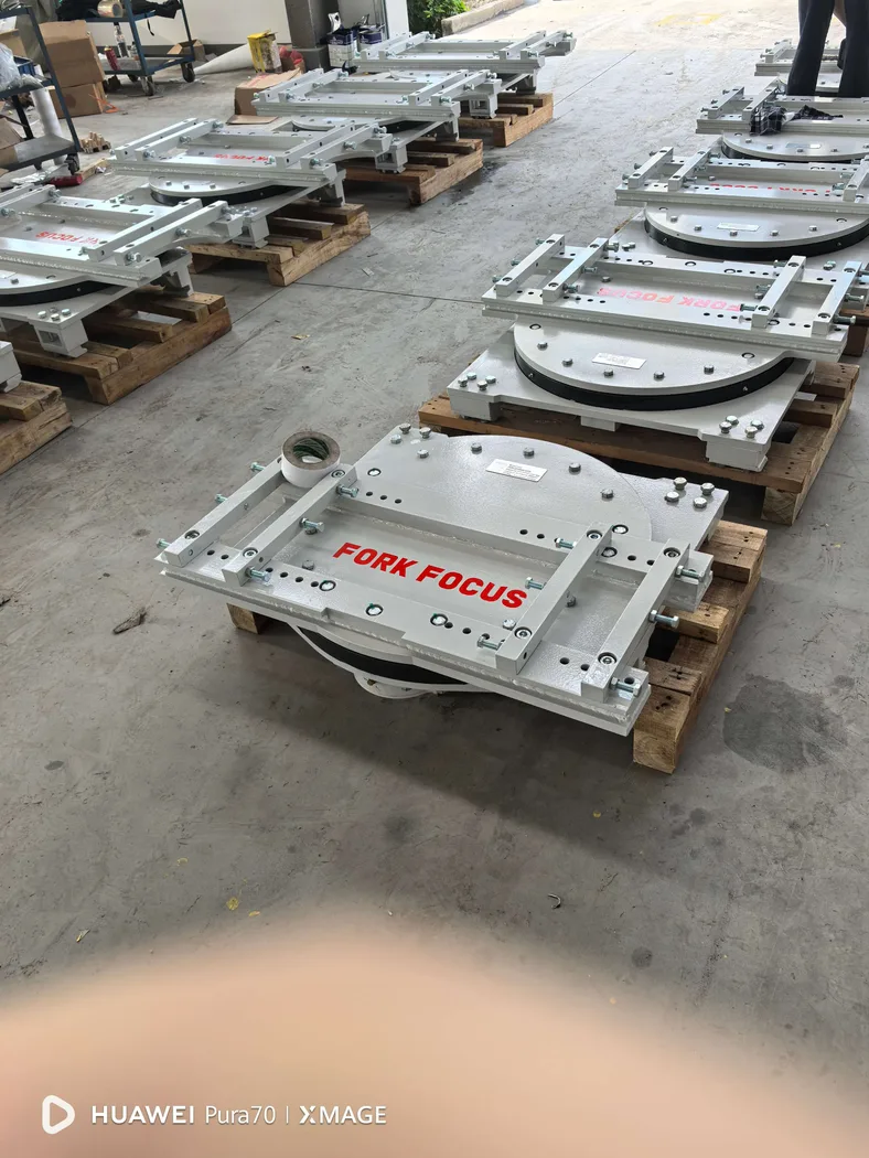 ForkFocus rotator attachment assemblies stored on pallets
