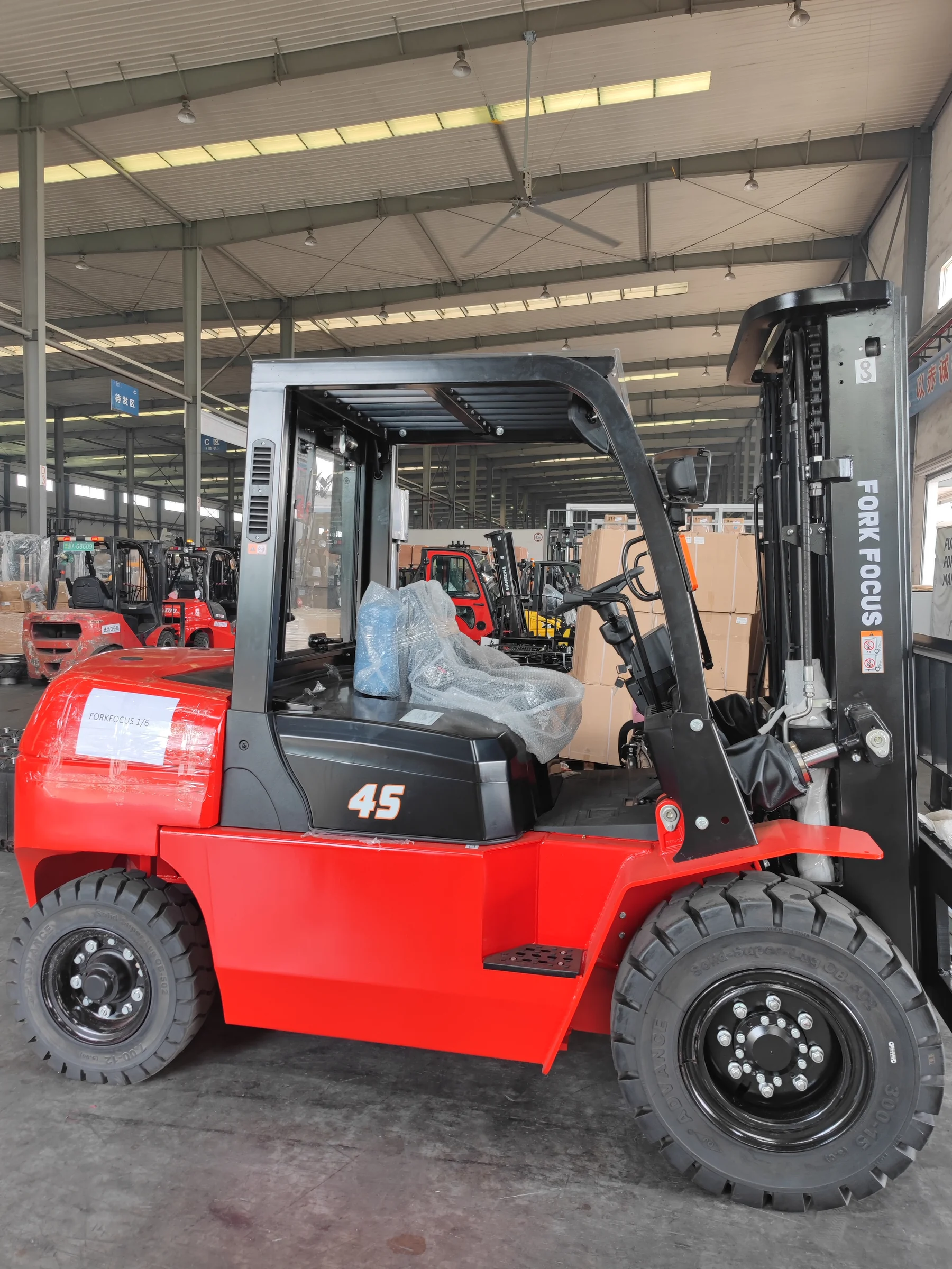 Diesel forklift prepared in a warehouse before dispatch