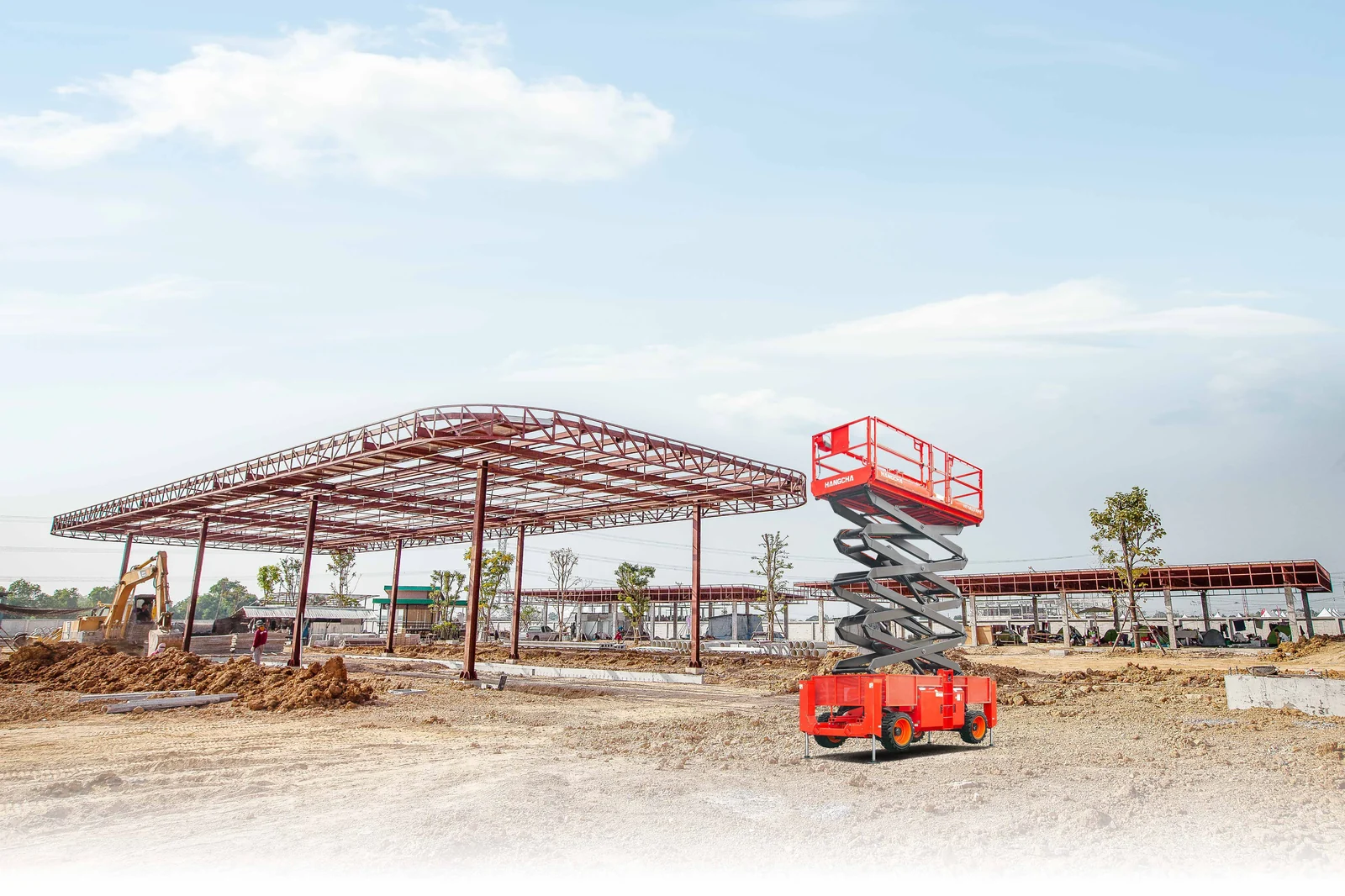 Hangcha electric RP rough-terrain scissor lift at a construction site